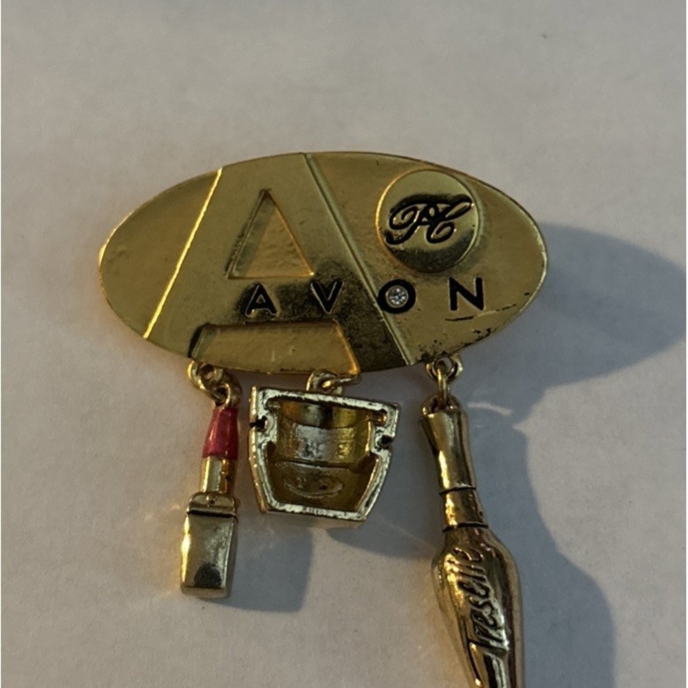 Vintage Avon Sales Representative Award Pin Gold Tone Makeup Dangle Charms